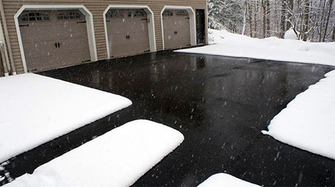 Heated asphalt driveway and walks. Heated asphalt driveway and walks